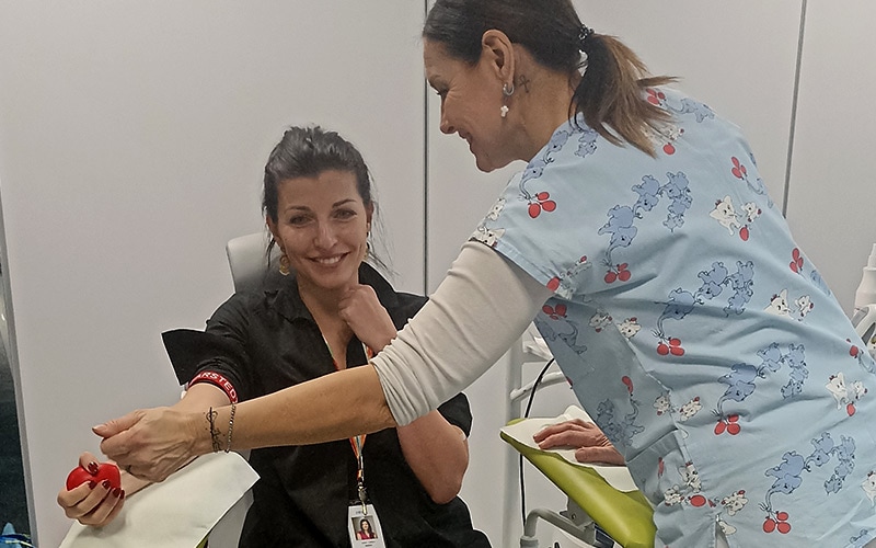 Kamila, a volunteer for blood donation, exemplifies Infosys' commitment to social responsibility in the Czech Republic.