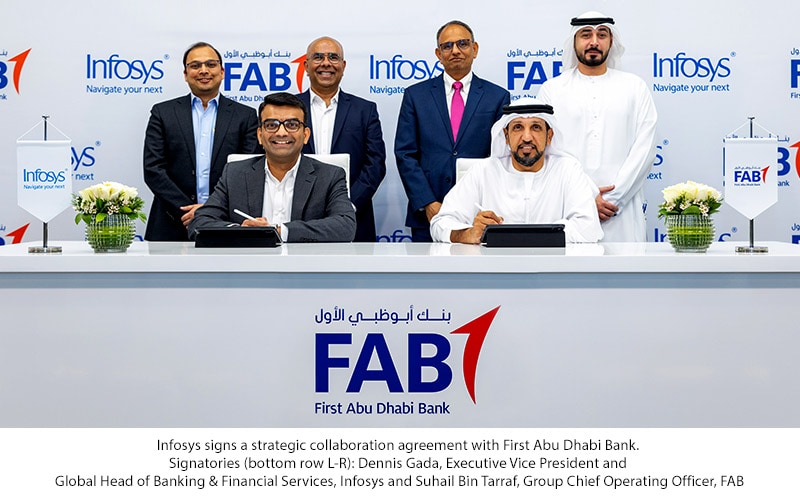 Infosys signs a strategic collaboration agreement with First Abu Dhabi Bank. Signatories (bottom row L-R): Dennis Gada, Executive Vice President and Global Head of Banking & Financial Services, Infosys and Suhail Bin Tarraf, Group Chief Operating Officer, FAB.